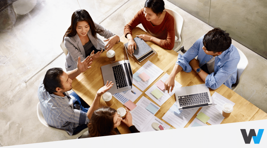 Small business employees working around a table