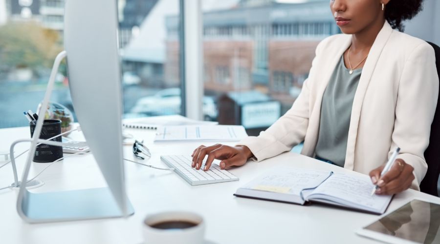 businesswoman determining how much to pay her new employee