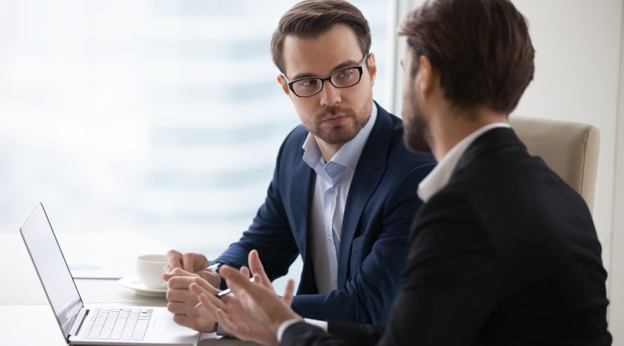 two businessmen talking