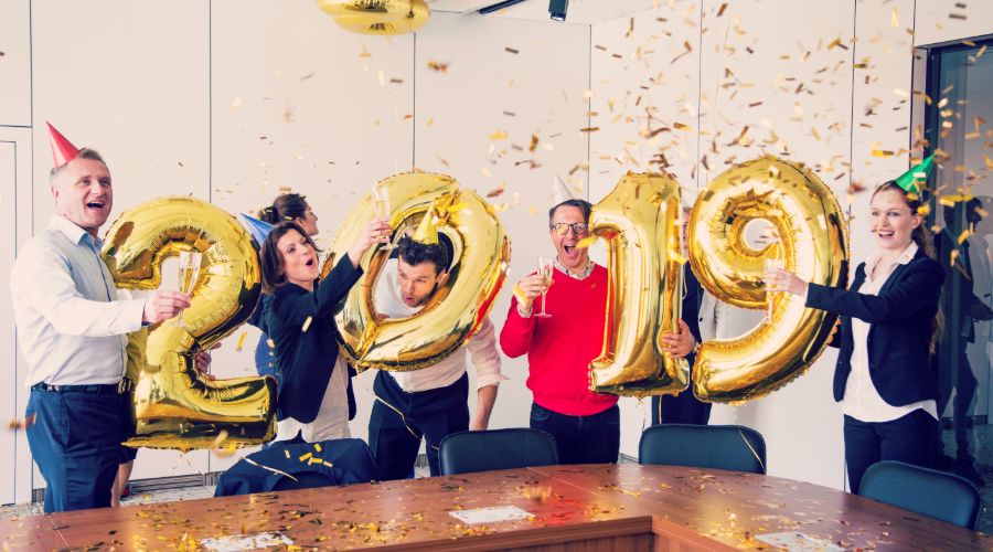 group of business people celebrating holiday new year 2019