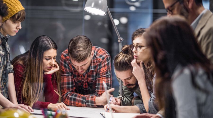 small business team analyzing their competition