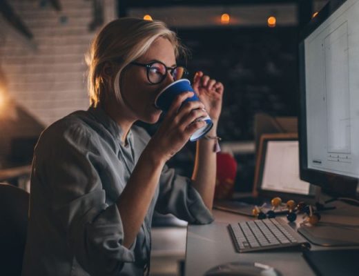 business owner works in office at night