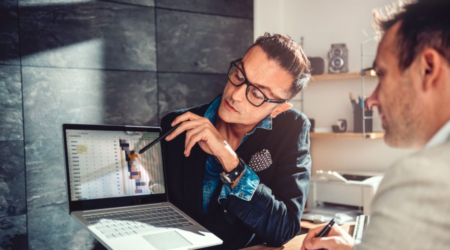 man explaining project timeline to a client