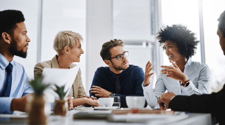 group of employees talking to each other