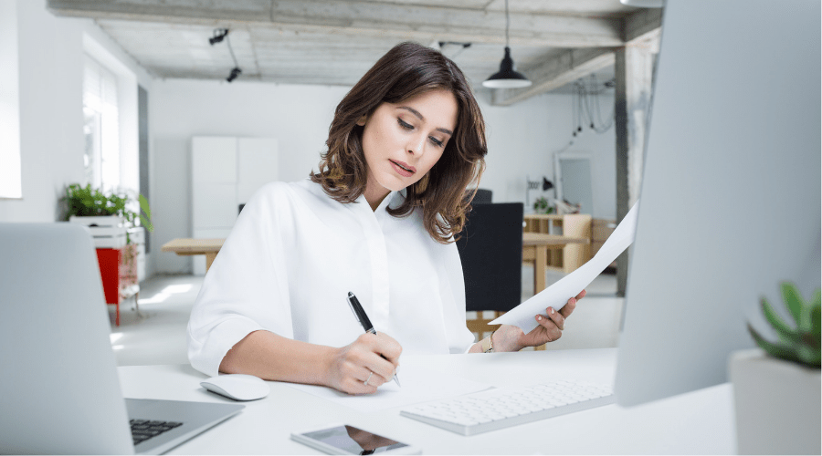 Professional woman setting up her company's chart of accounts