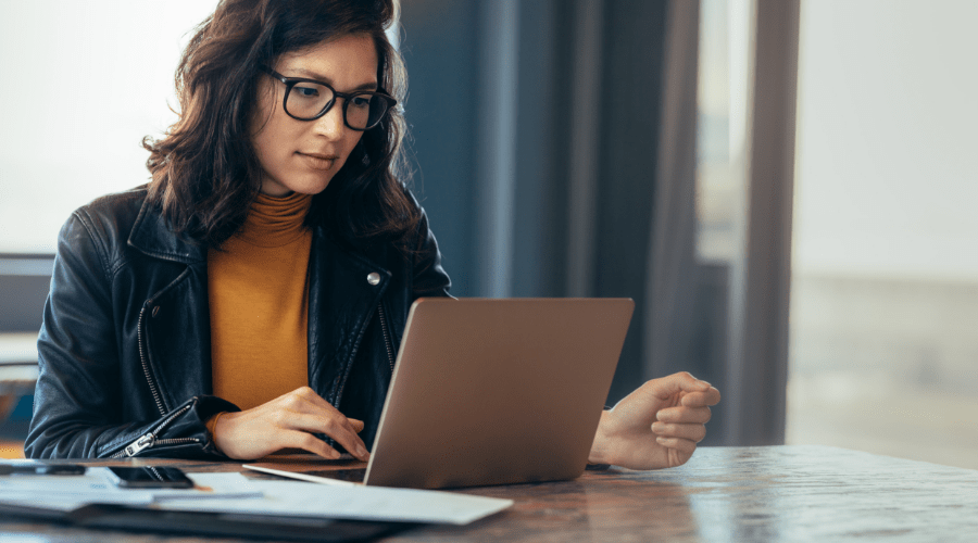 professional woman working on a laptop